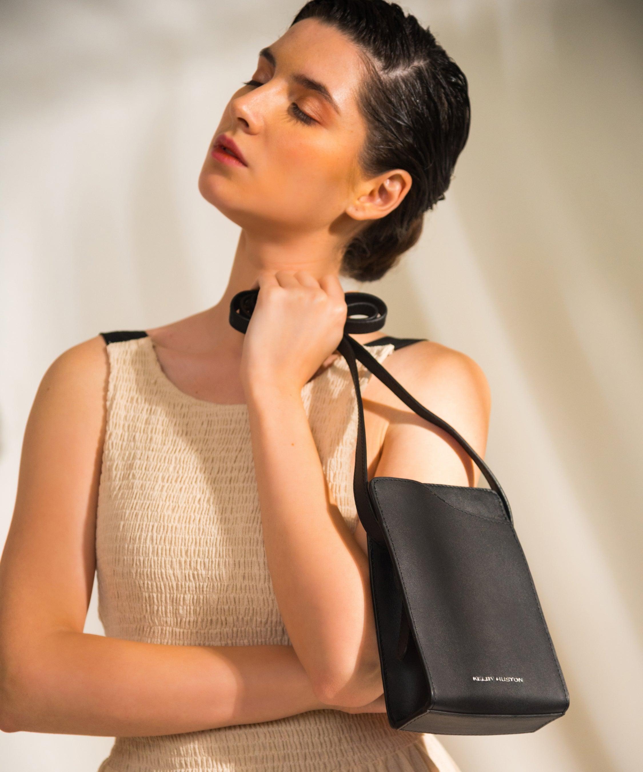 ADEL PHONE SLING - Black, a product by Kelby Huston